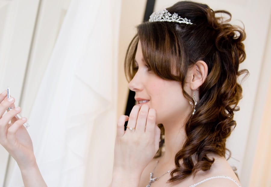 curly medium length wedding hairstyle with bangs