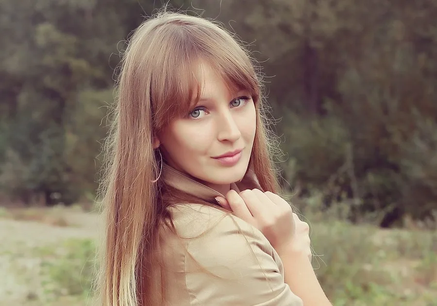 long brown hair with bangs for oval face