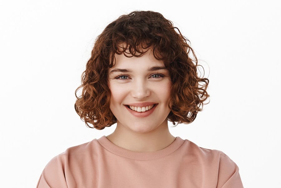 short curly bangs hairstyle for round face
