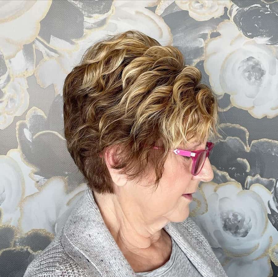 woman over 50 with short layered hair and highlights