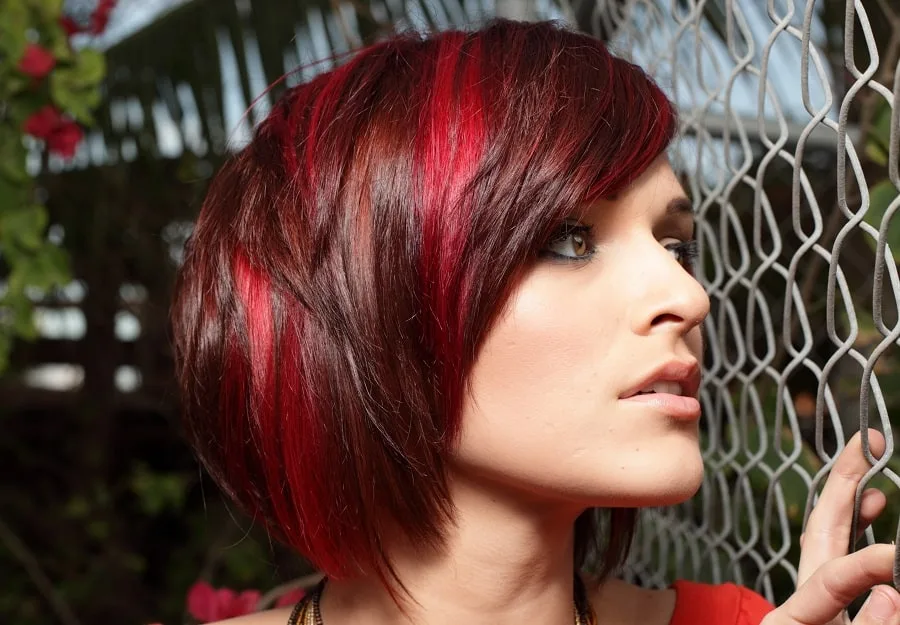 layered bob with red highlights