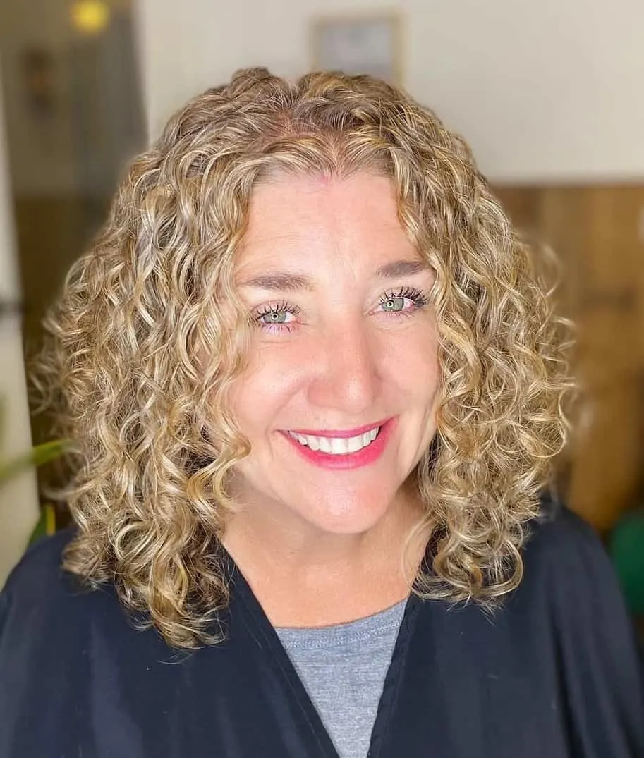woman with curly blonde bob