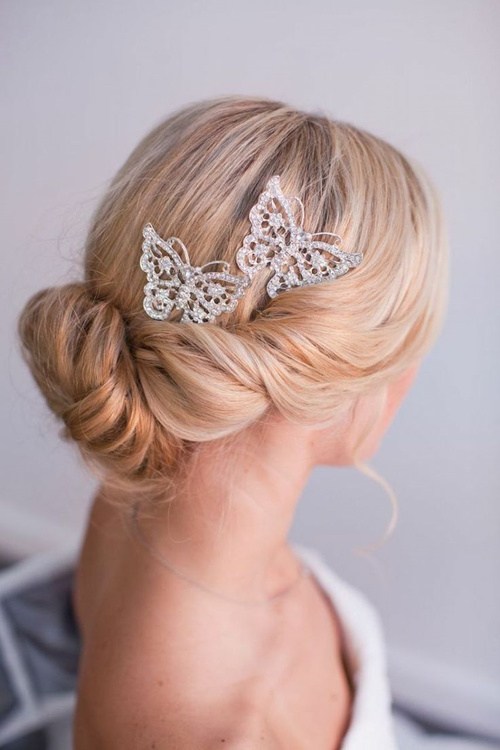 Beach Wedding Updo with Butterfly Accessory