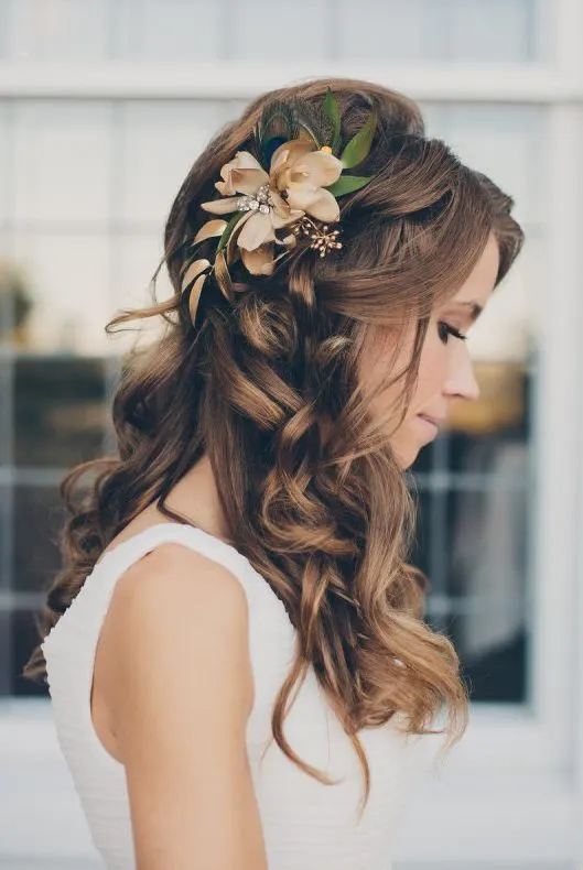 Loose Curled Wedding Hairstyle with Flower
