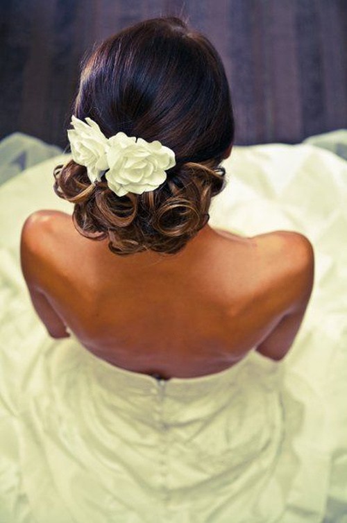 Low Updo with Flowers and Chic Ringlets