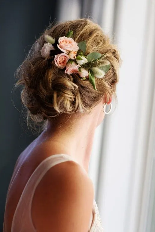 Twisted Wedding Updo with Blush Flowers