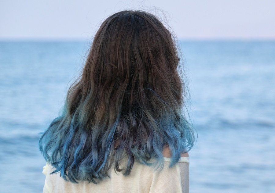 dark brown hair with blue dip dye