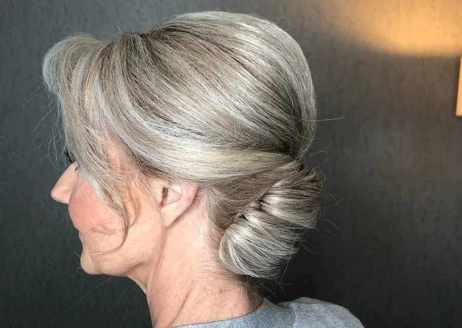 low bun hairstyle for mother of bride
