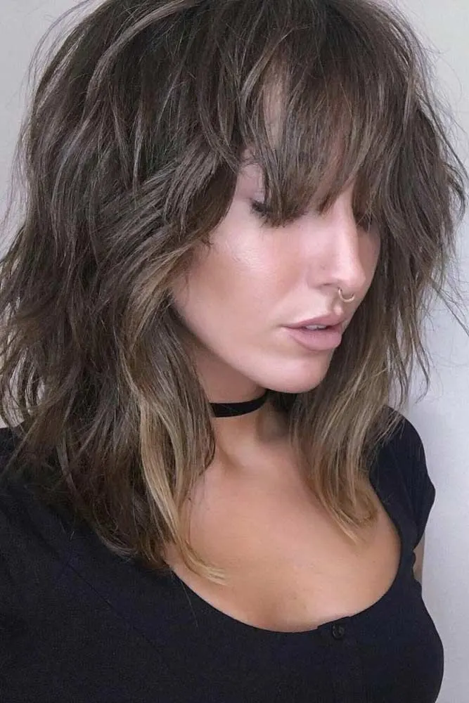 Messy Layered Hair with Wispy Bangs