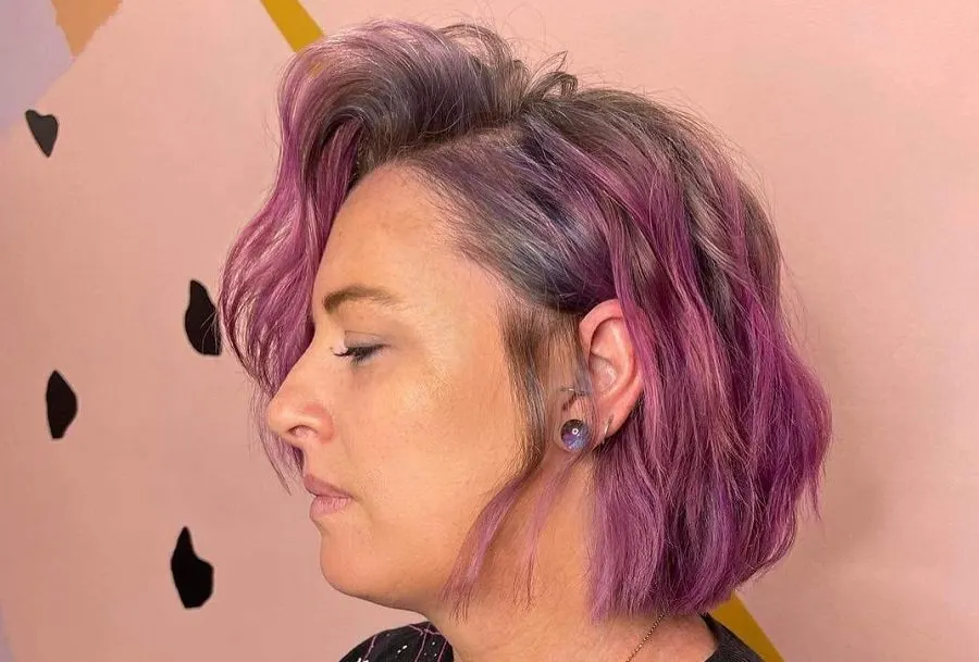 wavy bob with purple highlights for older women