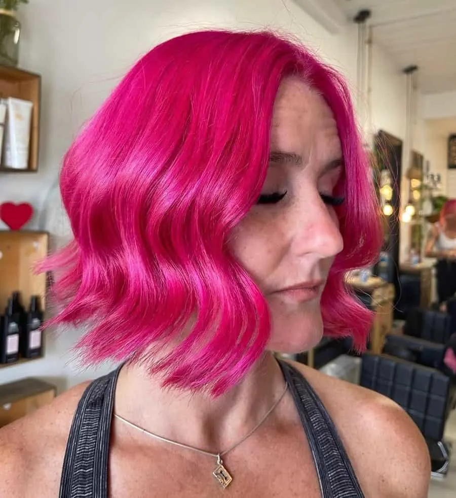 dark pink bob hairstyle for women over 50