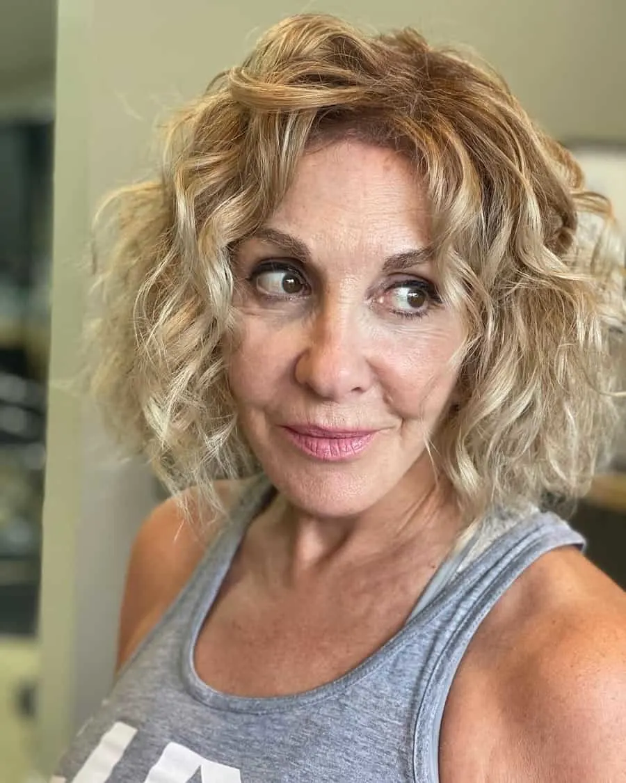 older women with messy curly blonde bob