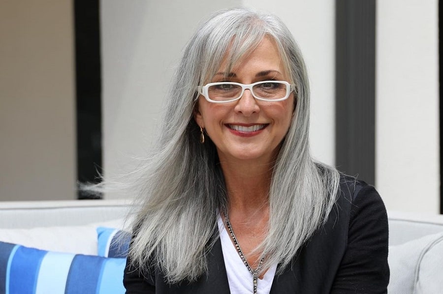 woman over 50 with straight silver hair