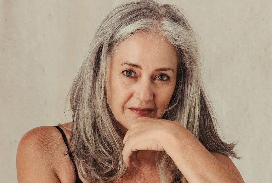 older woman with medium straight grey hair