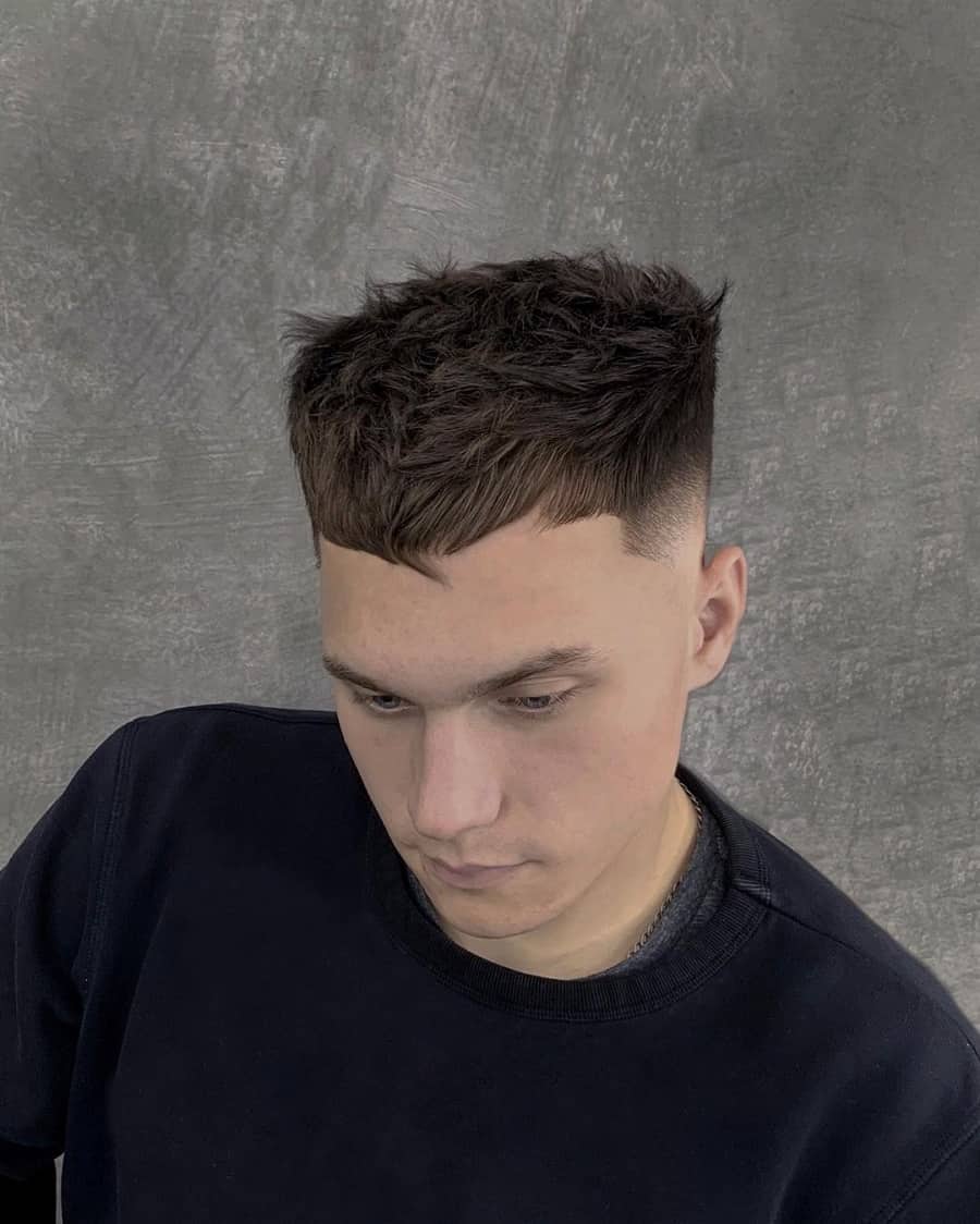 messy uppercut hairstyle for men