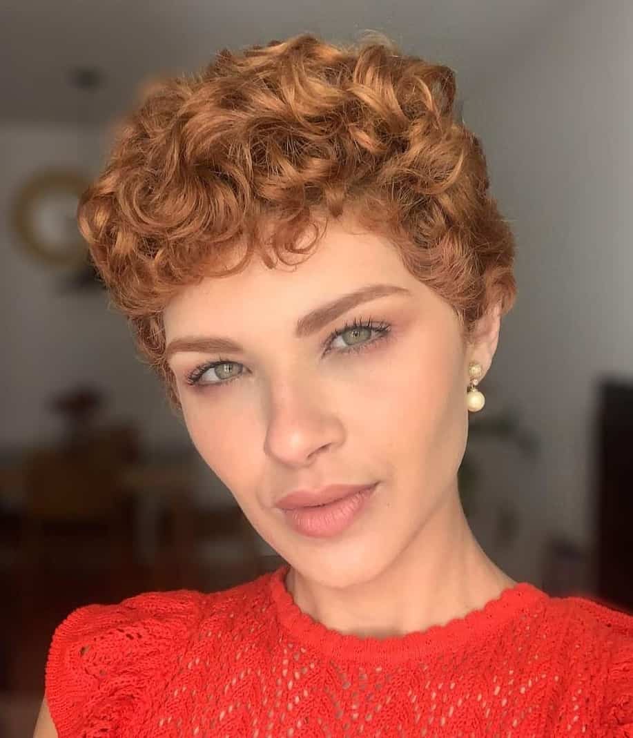 woman with very short curly blonde hair