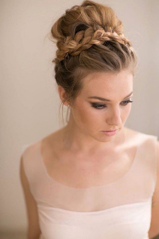 Large Bun Updo With Loose Braid On The Top