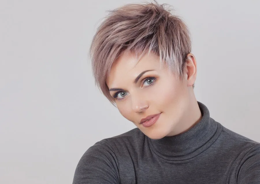 short pixie cut with blonde highlights
