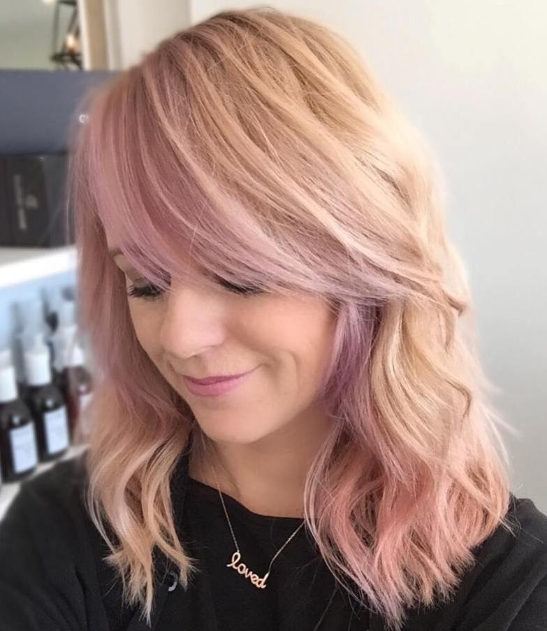 Pastel Pink Wavy Hair with Side Bangs