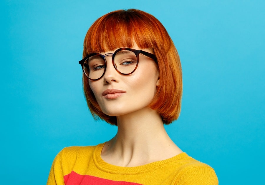low maintenance red bob cut with bangs