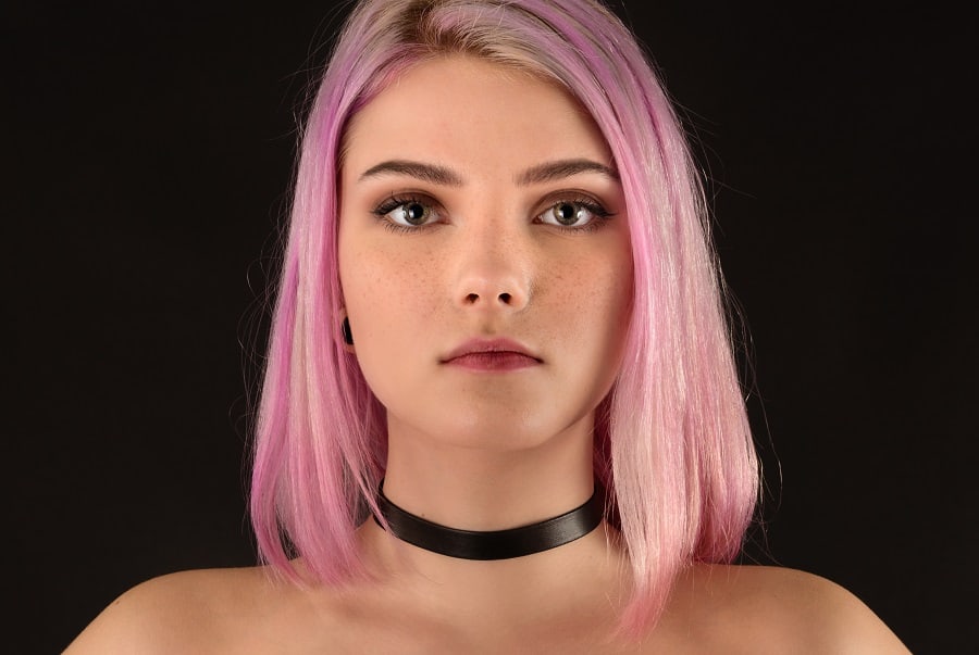straight blunt hairstyle with pink hair