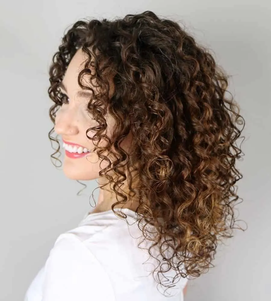woman with mid length curly hair