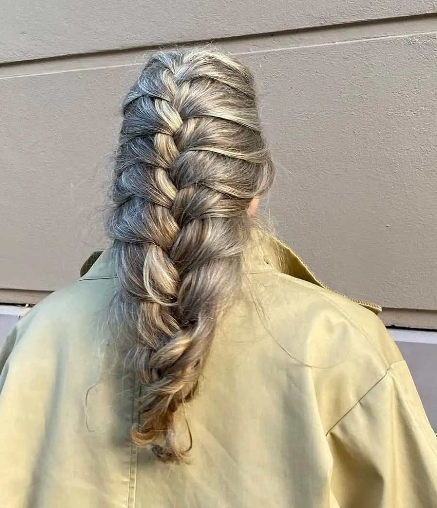 thick braid hairstyle with silver hair