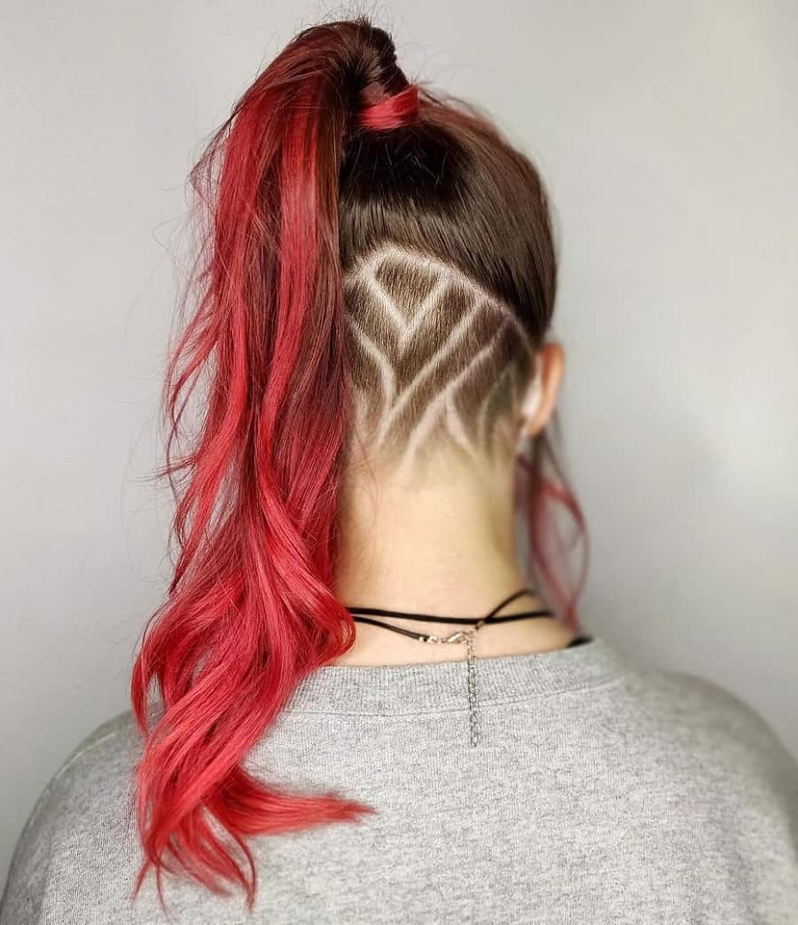 red ponytail with shaved hairstyle