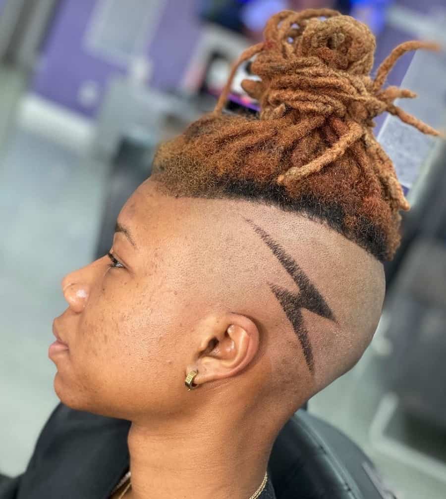 black woman dreadlocks with shaved side