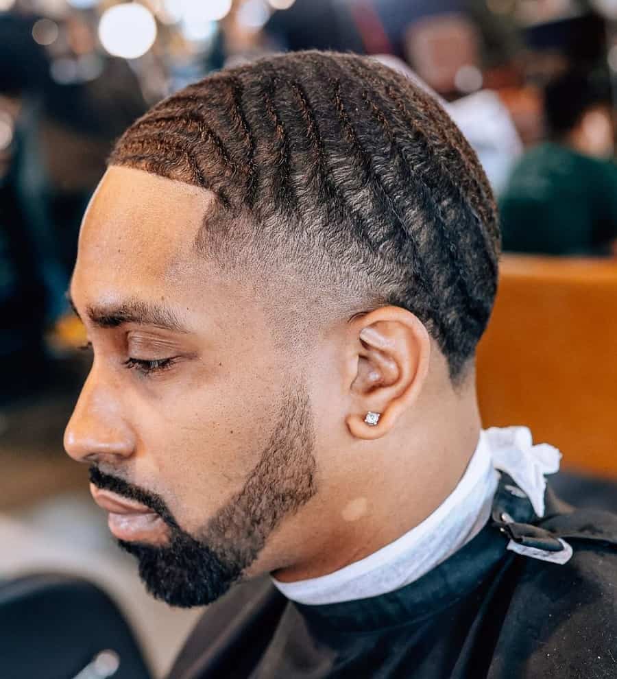 black men taper fade haircut with beard