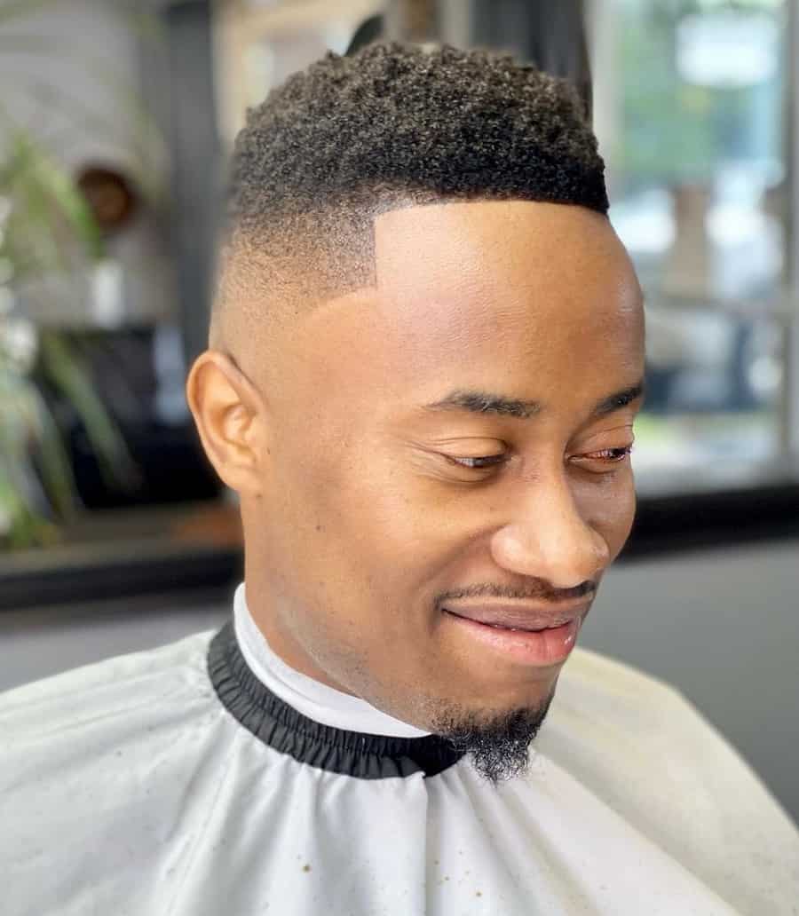 black guy with high taper fade haircut