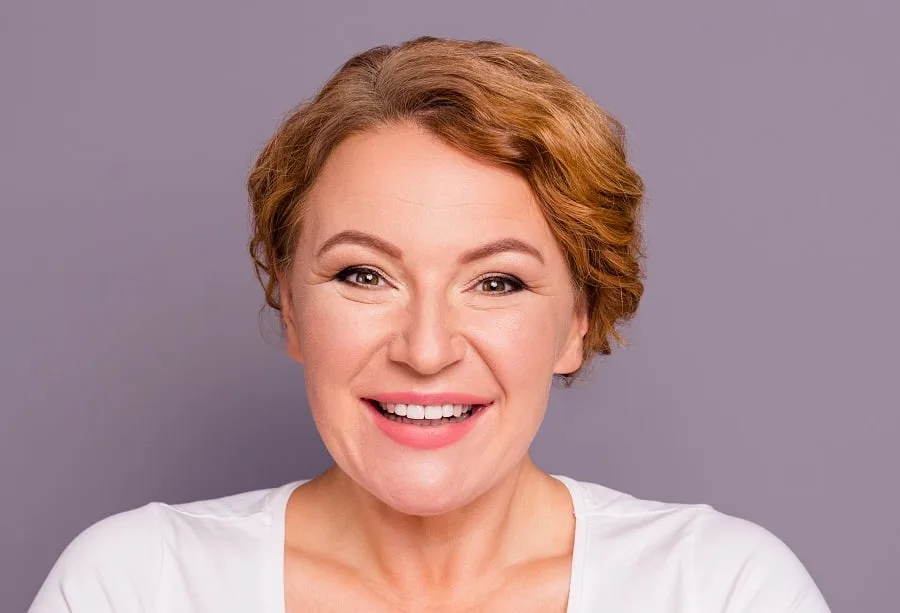 short blonde hairstyle for older woman with chubby face