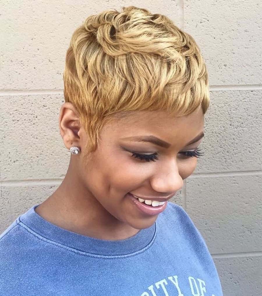 black woman with wavy blonde pixie cut