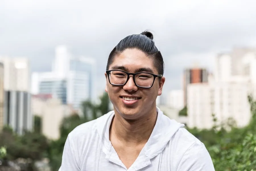 Korean man with top knot hairstyle