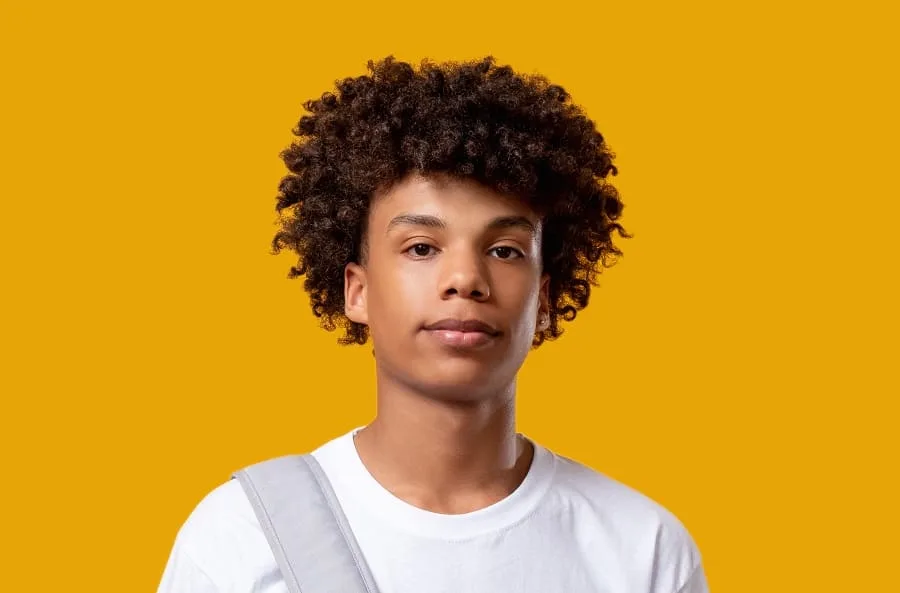 black boy with curly afro hair