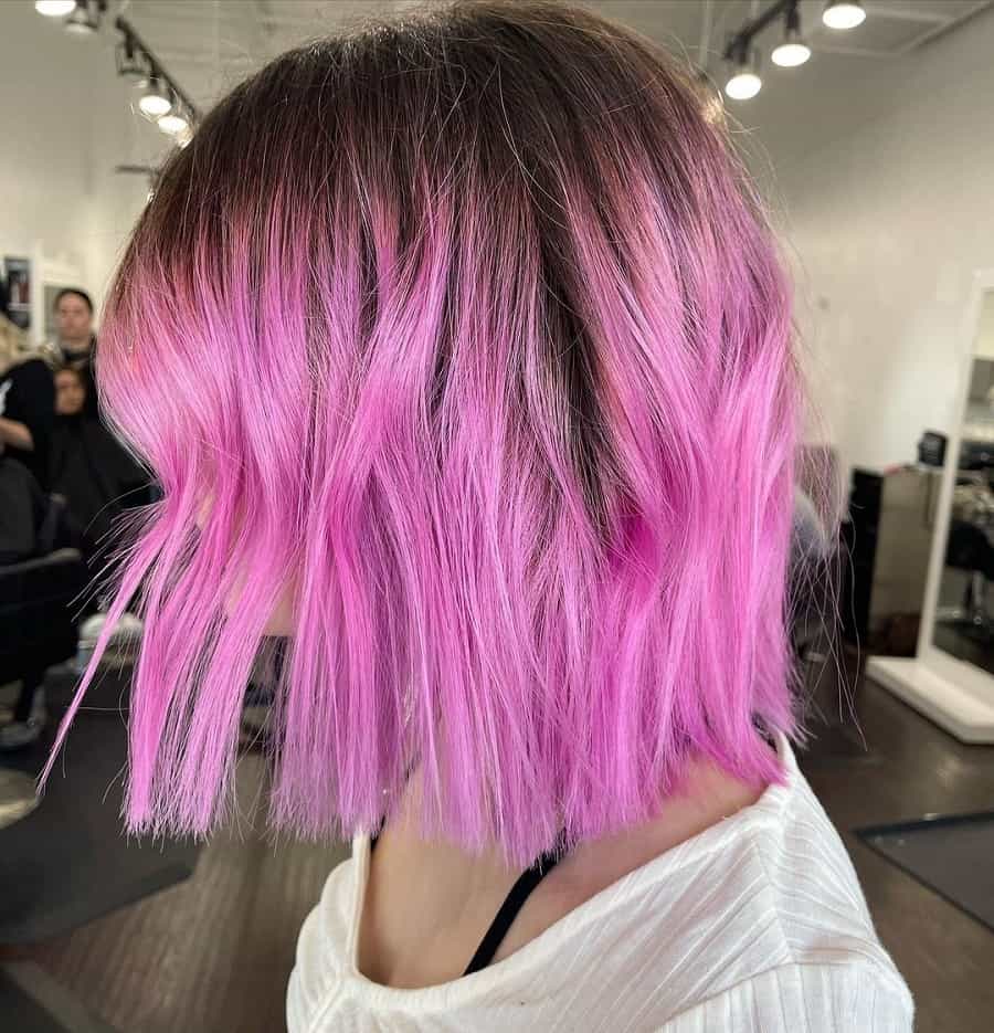 wavy blunt bob with pastel pink hair