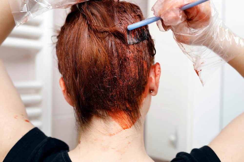 dye your hair darker to get rid of orange hair