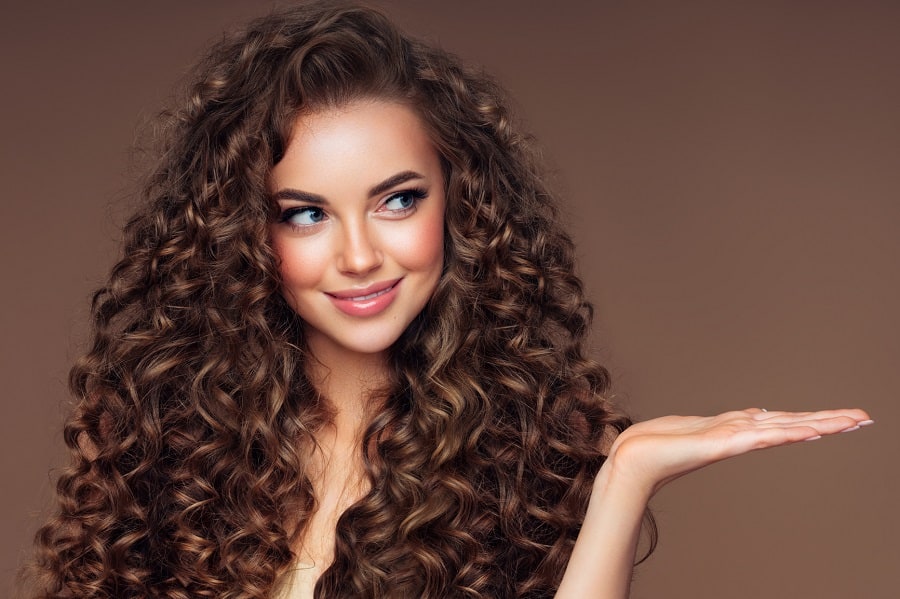 long curly perm brunette hairstyle