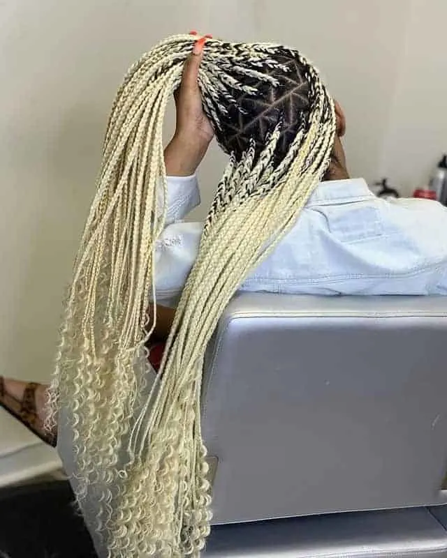 triangle box braids with curly ends