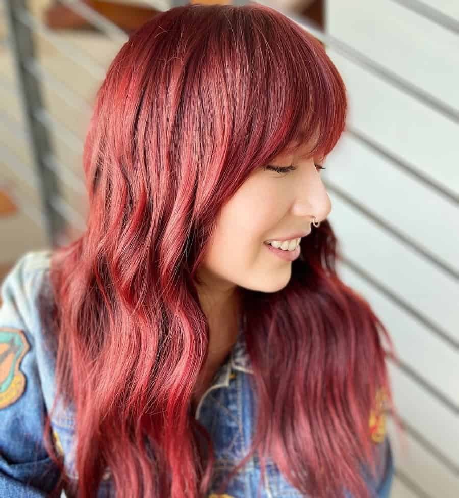 long face framing red hairstyle