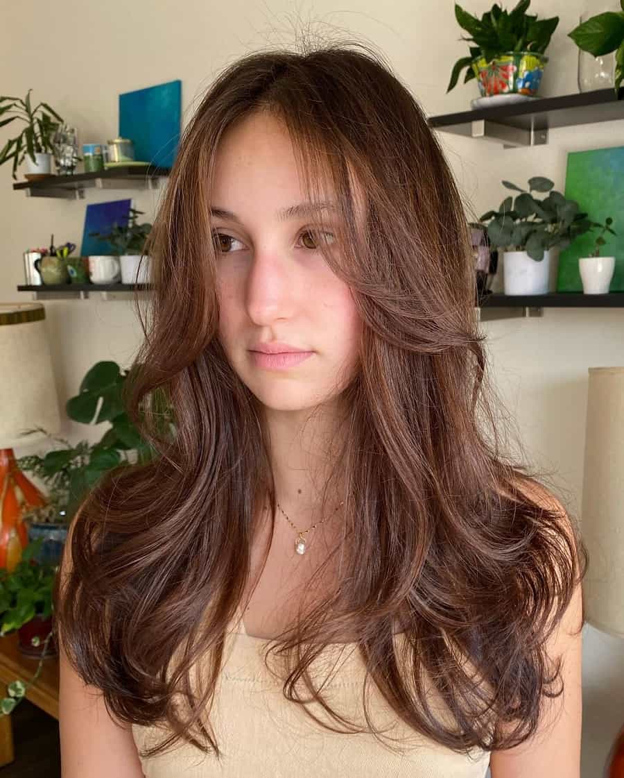 face framing brunette hairstyle