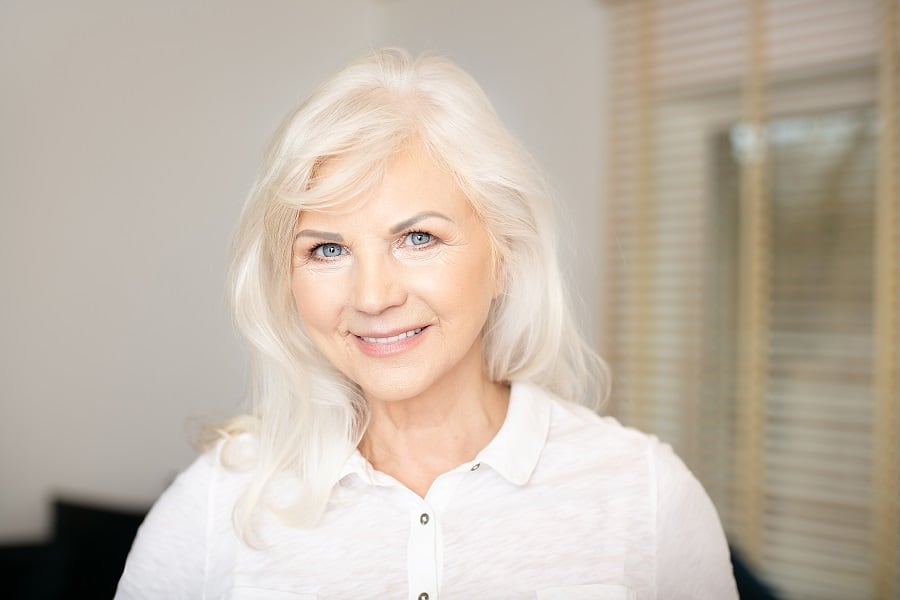 white blonde hairstyle for older woman with round face