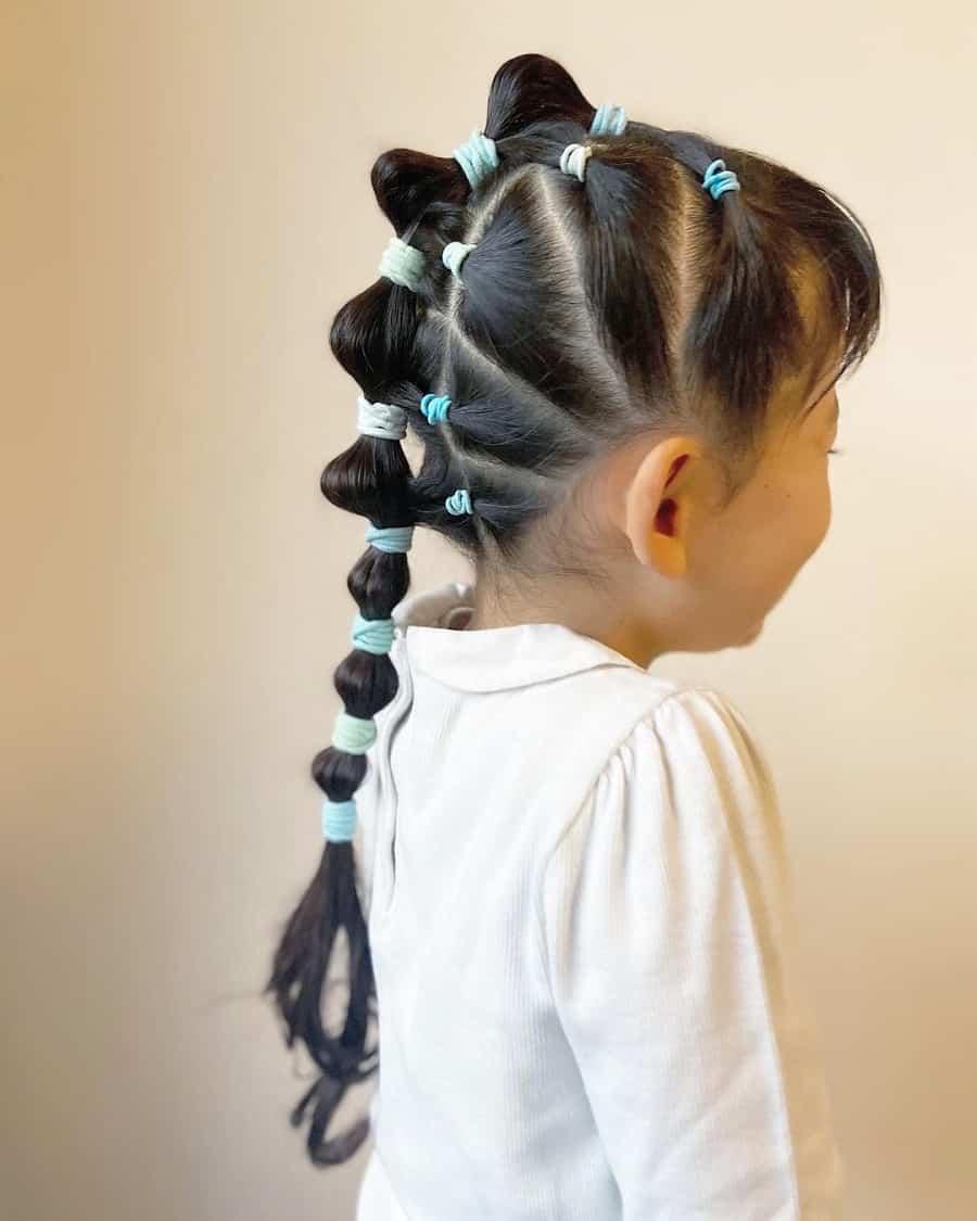 little girl with bubble ponytail hairstyle