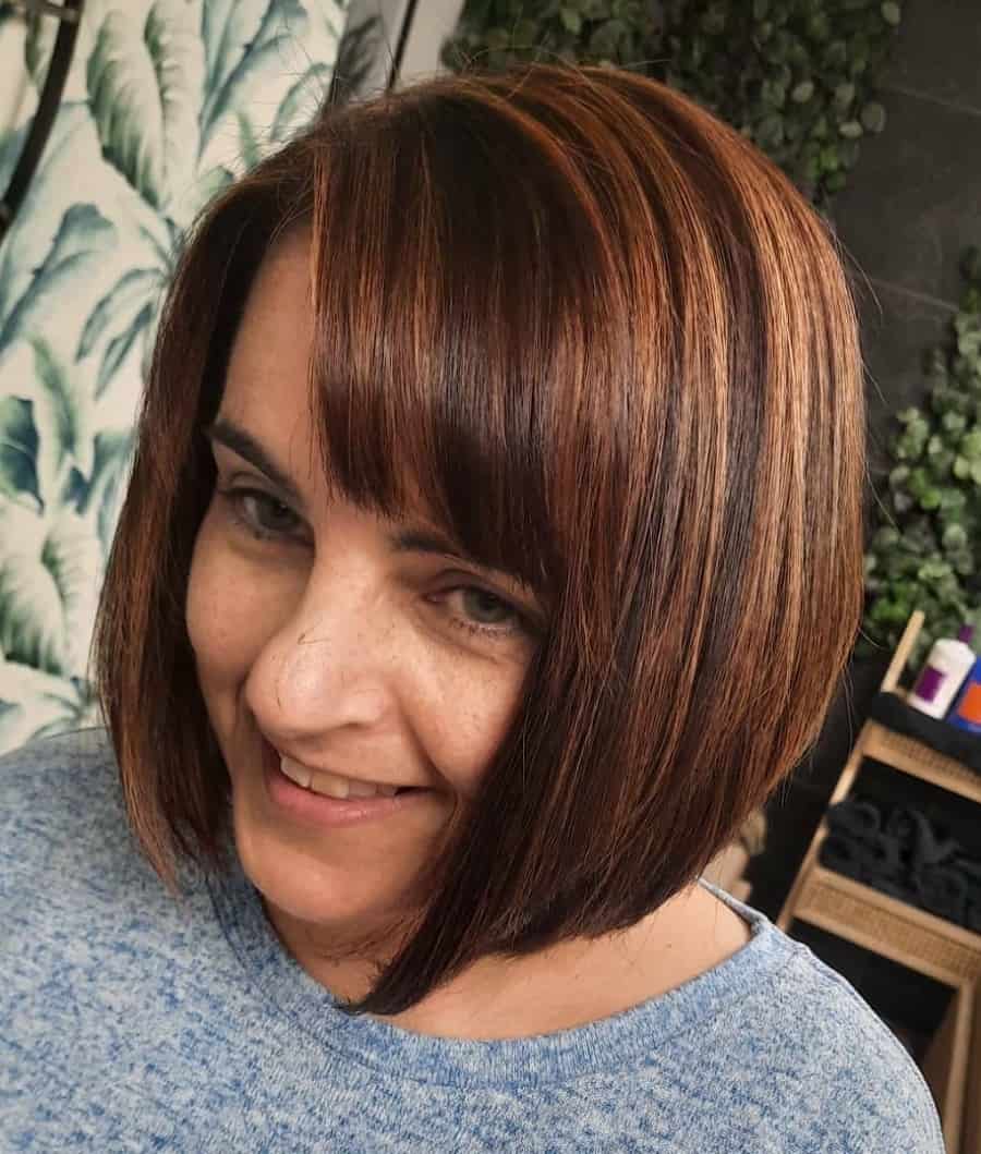 dark brown bob with bangs and lowlights