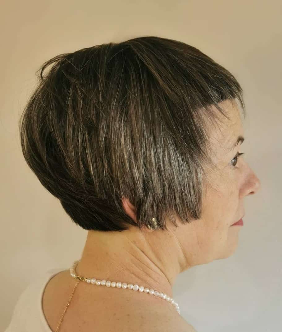woman over 50 with short bob and bangs