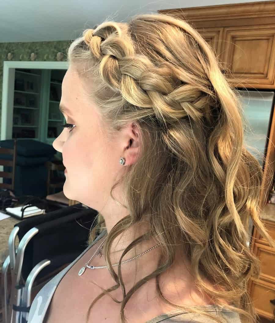 side braid hairstyle with blonde wavy hair