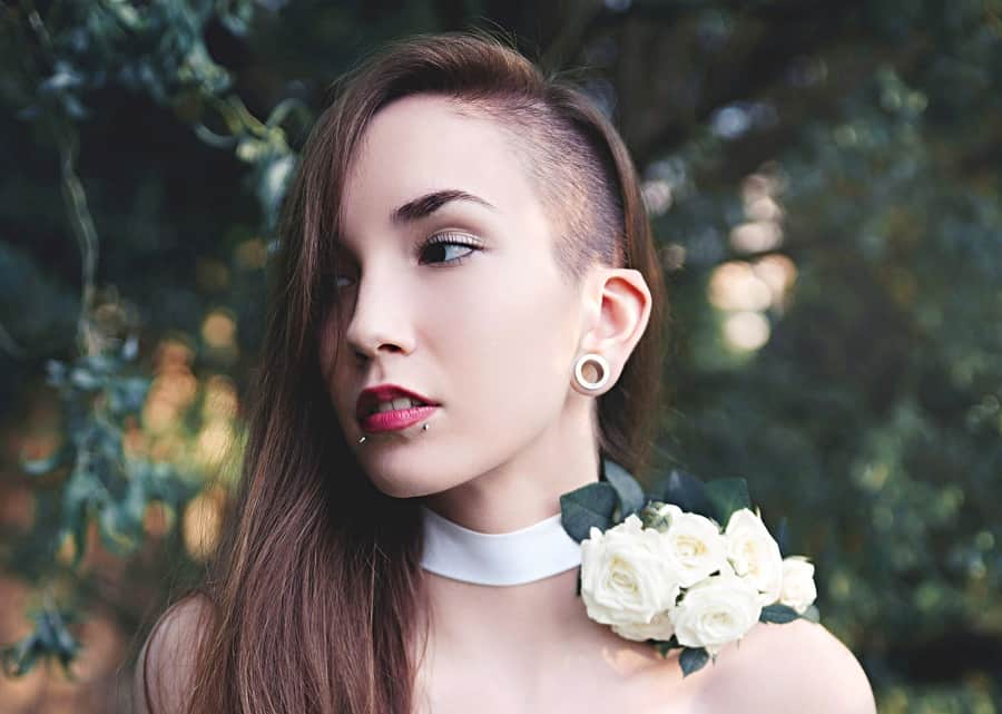 woman with long shaved hairstyle